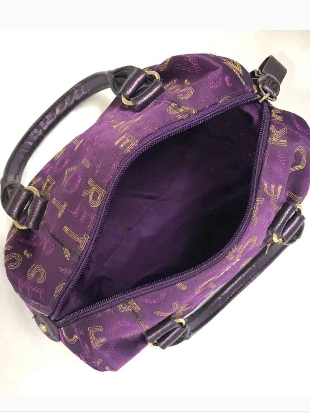 New Victoria's Secret gold/purple embroidered handbag